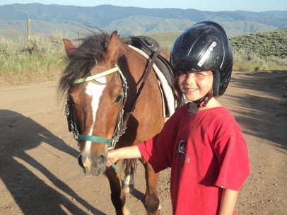Calli riding her pony Mini at BoulderCrest Ranch