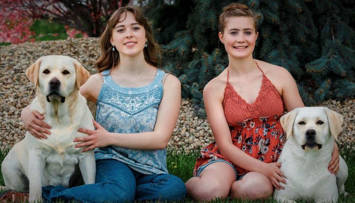 Abrie and Tori with Holly and daughter Elsa our English Labrador Retreivers